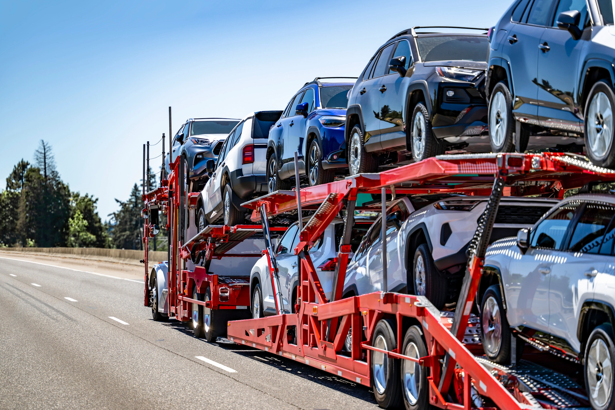 Should I consider open or enclosed SUV transport?